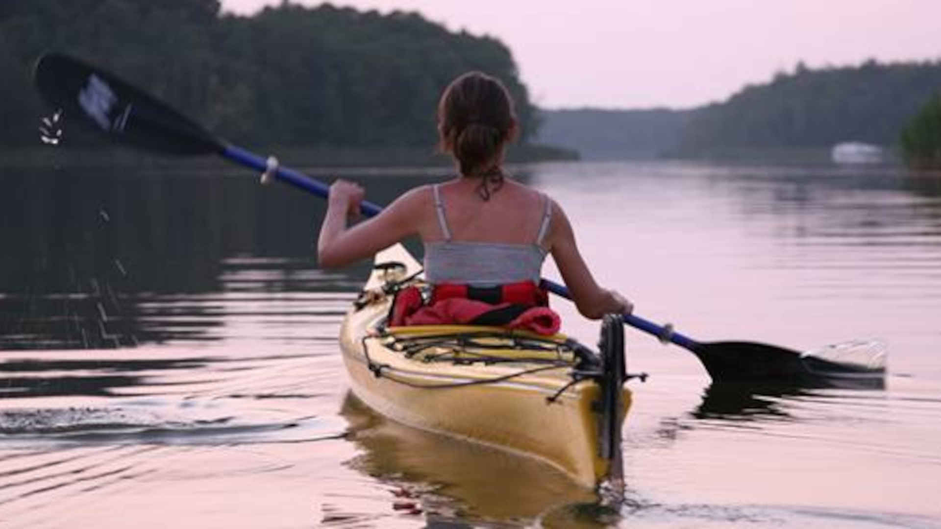Woman kanu paddling